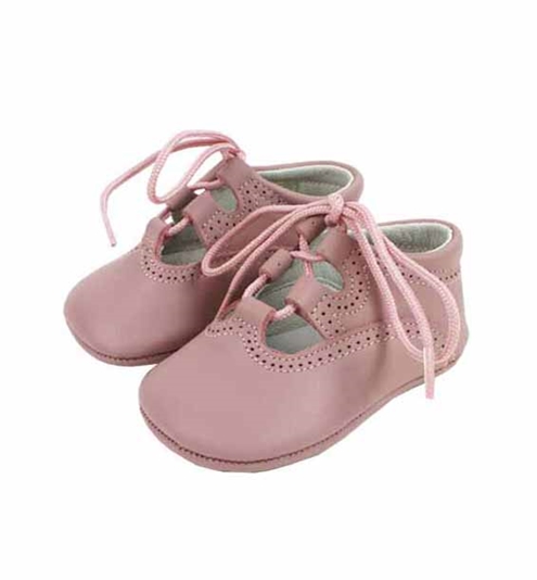 Baby shoes in pastel pink