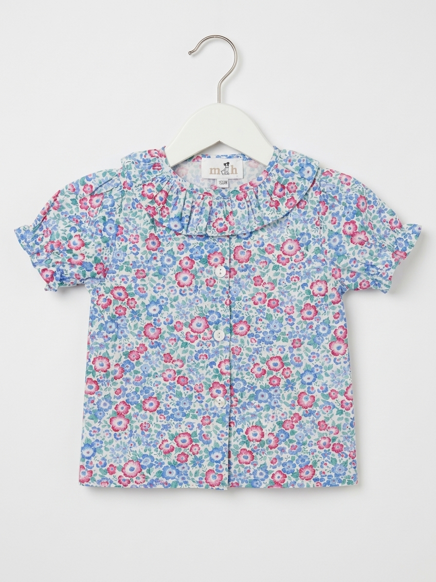 Blusa volante azul rosas