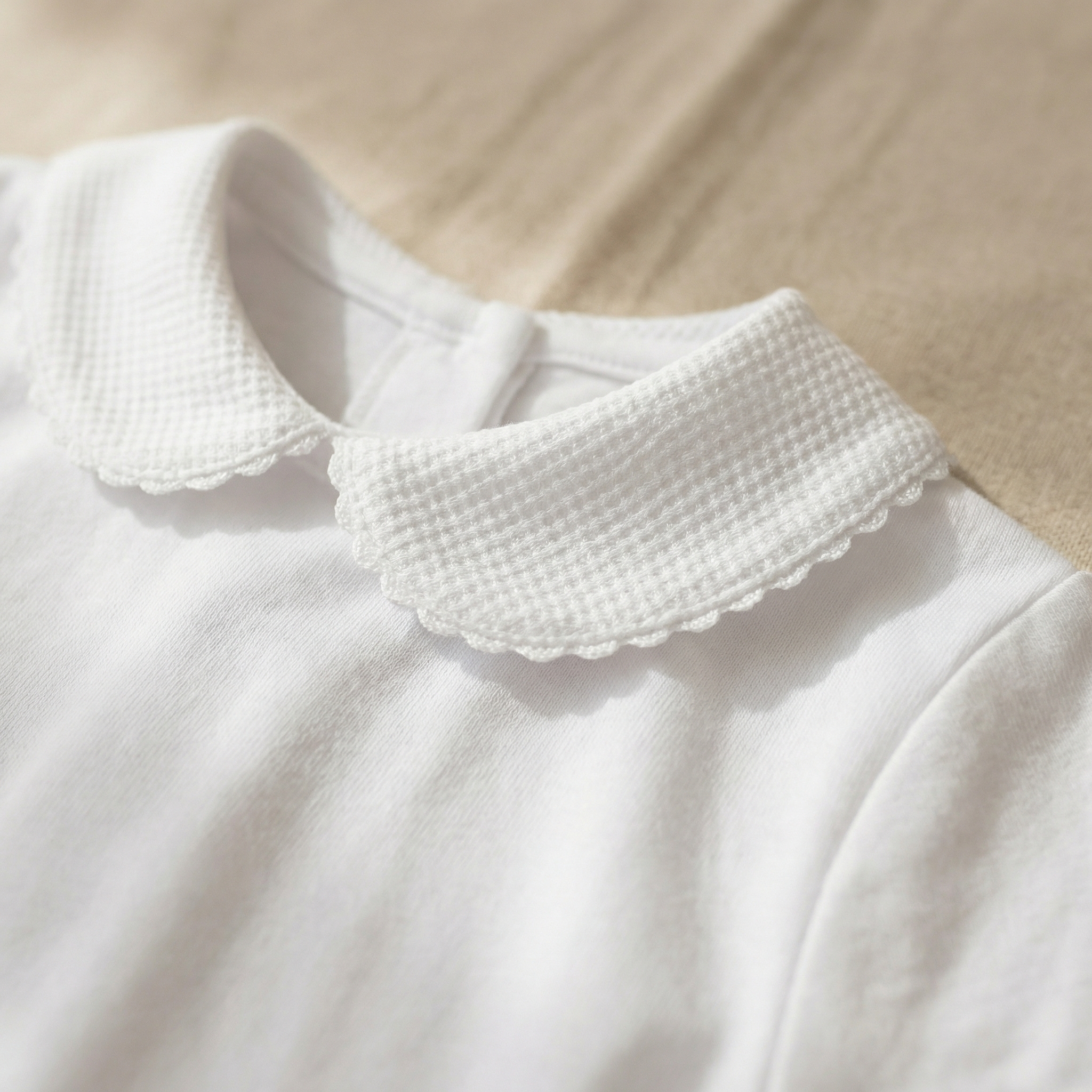 body bebé manga corta cuello bebé piqué ribeteado blanco babidú