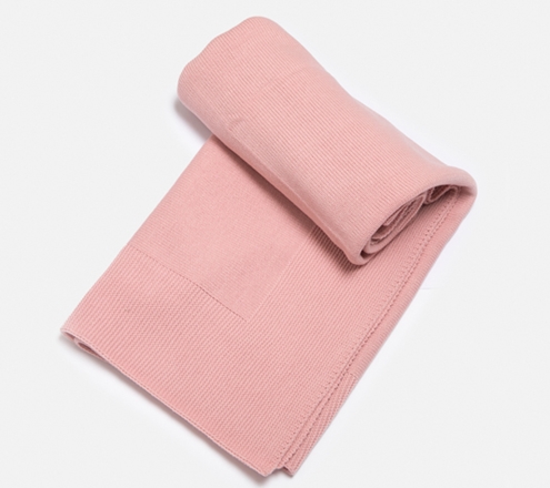 pastel pink blanket knitted