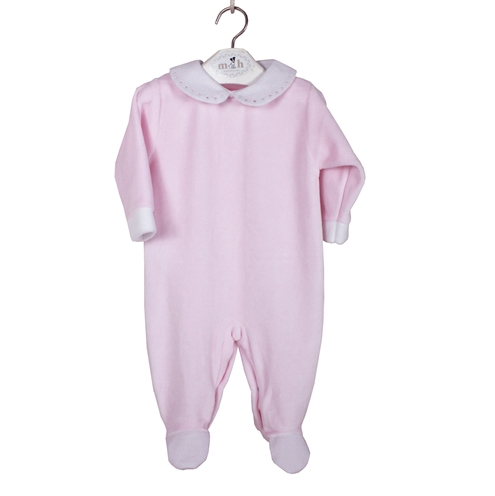 Pink velvet sleepsuit with polka dots